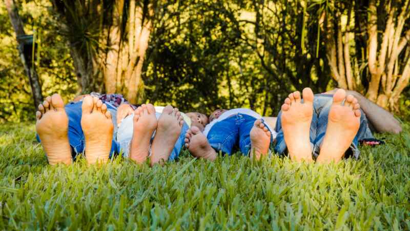 grounding in nature bare feet on grass